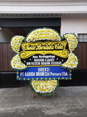 Papan Bunga Duka di Meras